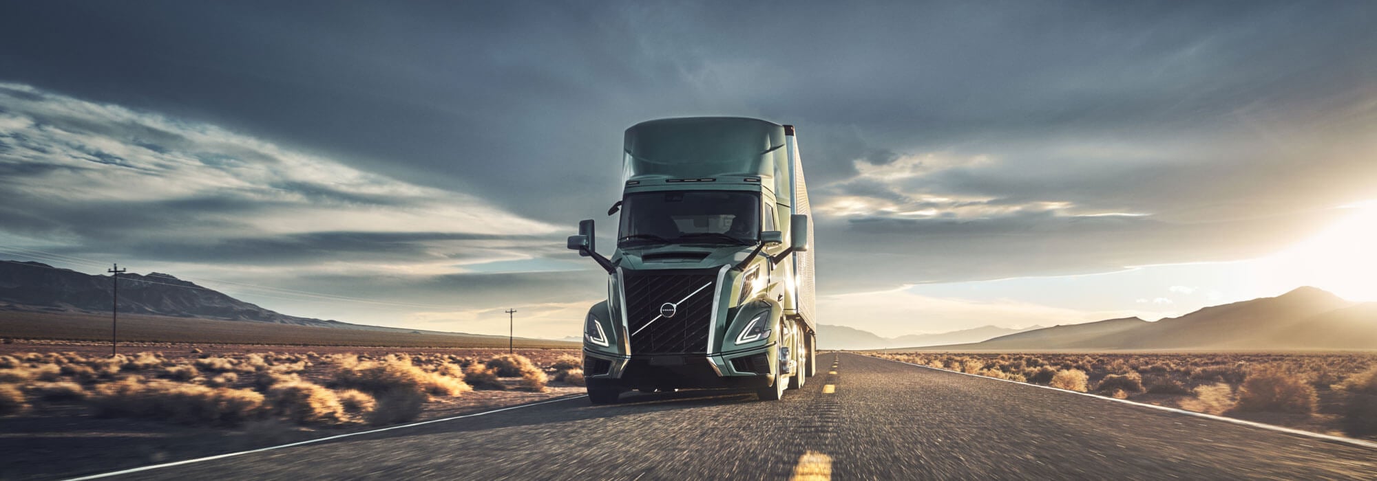 Volvo Semi Truck Driving Down Road
